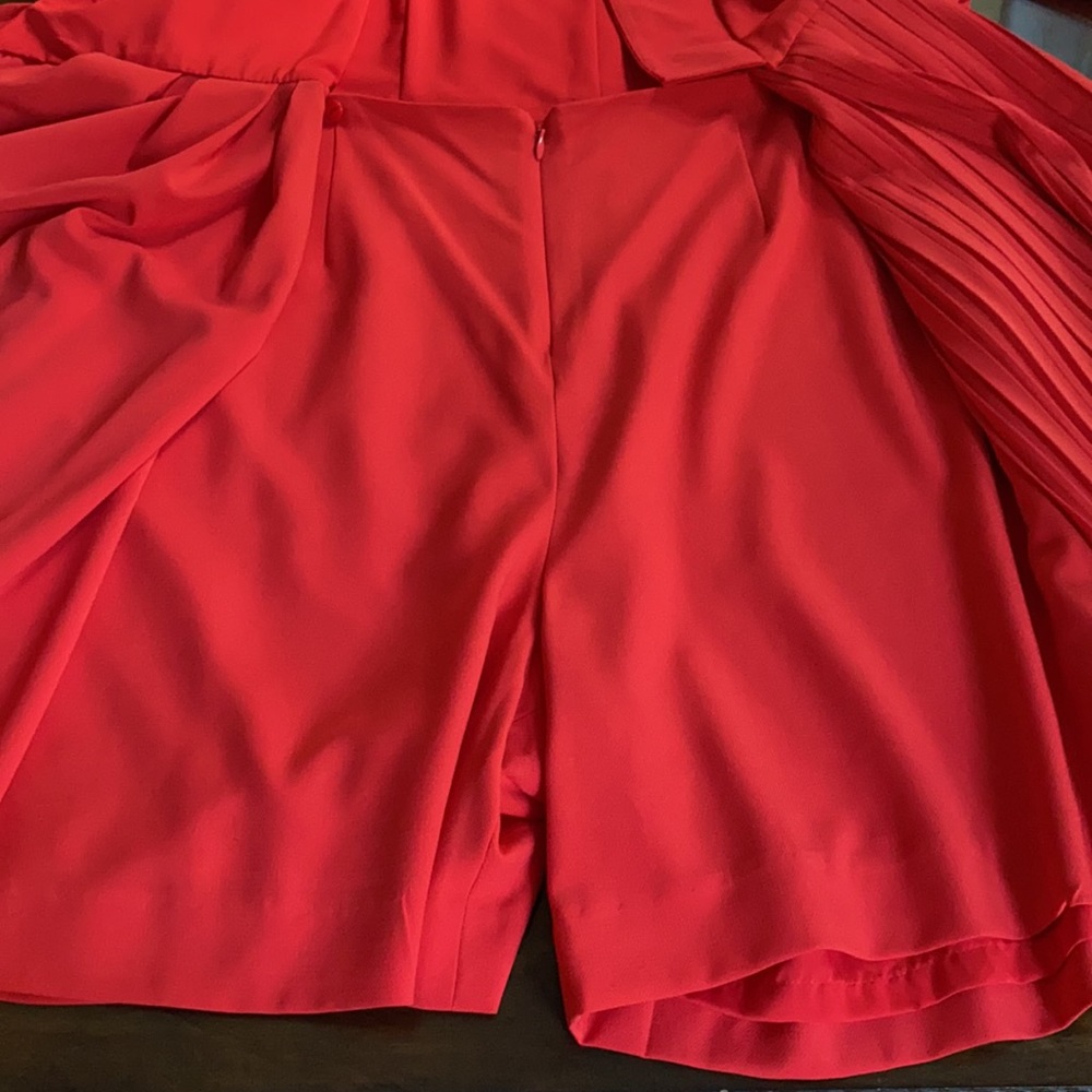 Alex Marie
Arielle Short Sleeve V-Neck Tie Front Romper Dress. - Picture 6 of 12